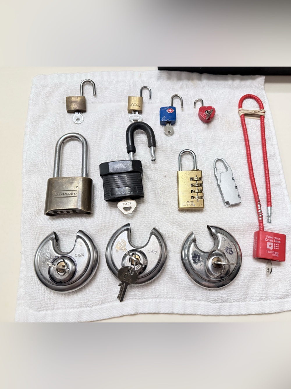 Huge bundle of various types of locks all with keys or combos provided